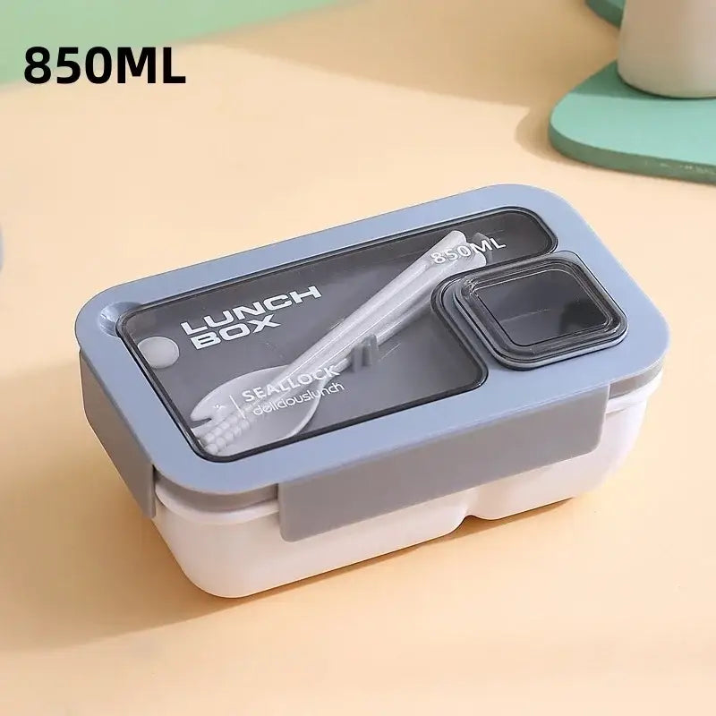 Gray and white decorbites bento box set with two compartments and sealed utensil section for convenient food storage