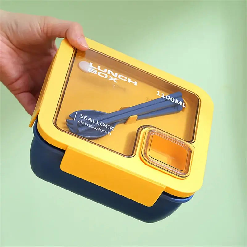 Yellow and navy blue pastel decorbites bento box set with two compartments and built-in spoon and chopsticks