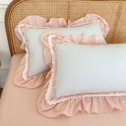 Pastel blue and pink ruffled cotton pillowcases with subtle checkered pattern from decorbites blue pink lattice bedding set