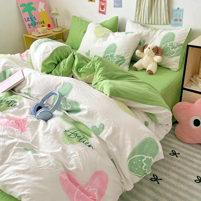 Pastel blue and white bunny cartoon pattern bed sets with green and white strawberry-themed bedding in cotton material