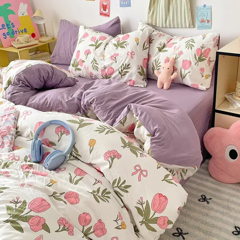 Pastel blue and white cotton bed sets with a soft lavender floral duvet featuring pink tulip decorbites cartoon pattern