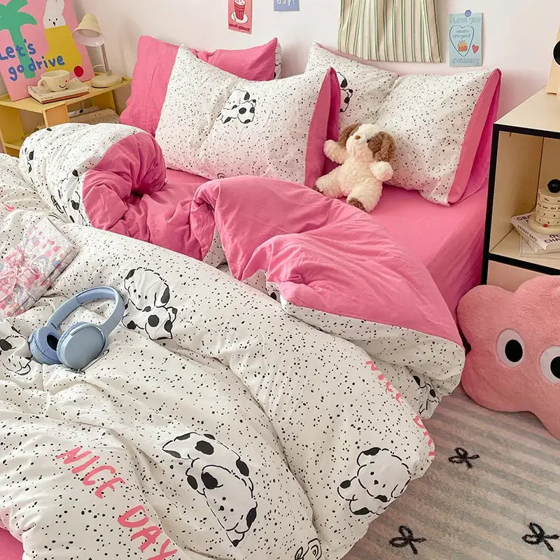 Pastel blue and white bed sets featuring a pink and white dog-themed decorbites cartoon pattern in cotton fabric