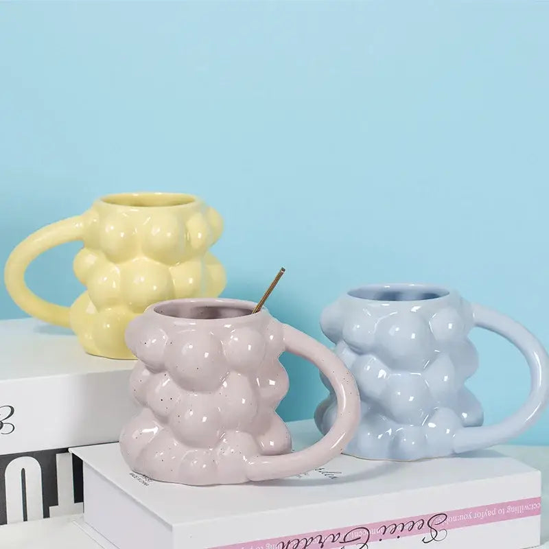 Pastel bubbly grape ceramic mug with textured surface and rounded handle perfect as a kitchen milk cup gift