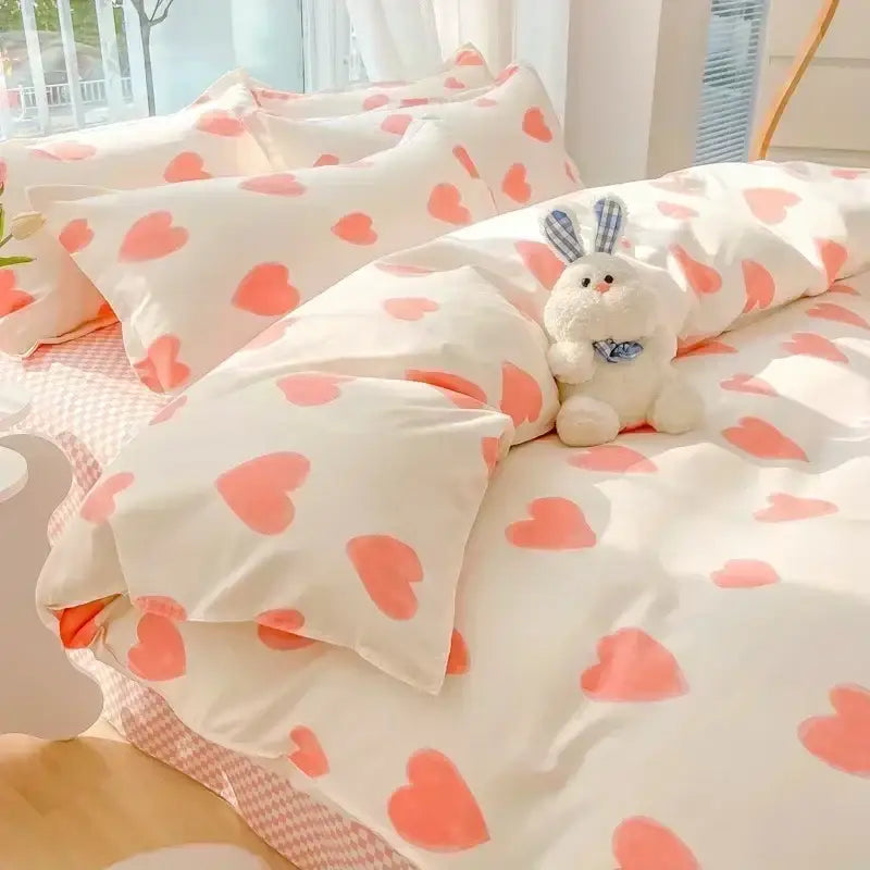 Cotton duvet bedding set with soft white base and coral pink hearts featuring decorbites cartoon print design
