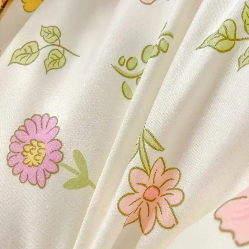 White fabric bedding set with pastel bunny and delicate pink yellow flower cartoon print for bedroom decorbites decor