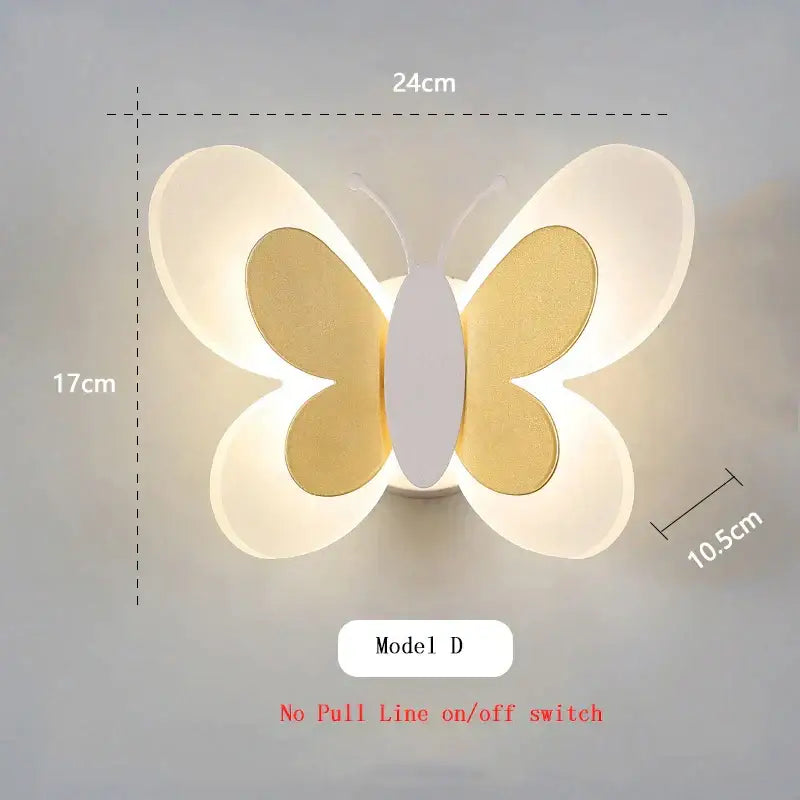 A modern pastel butterfly wall lamp with illuminated white wings and gold-toned inner sections for kids bedroom decorbites butterfly wall lamp