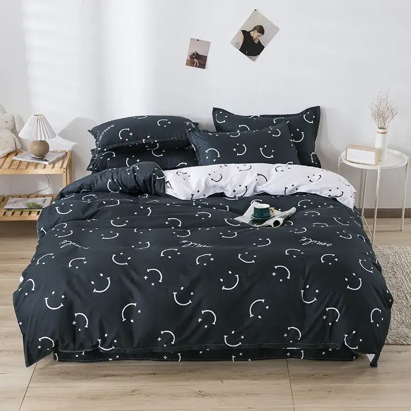 Black duvet set with white smiley face and star patterns from decorbites happy dog duvet set for bedroom bedding