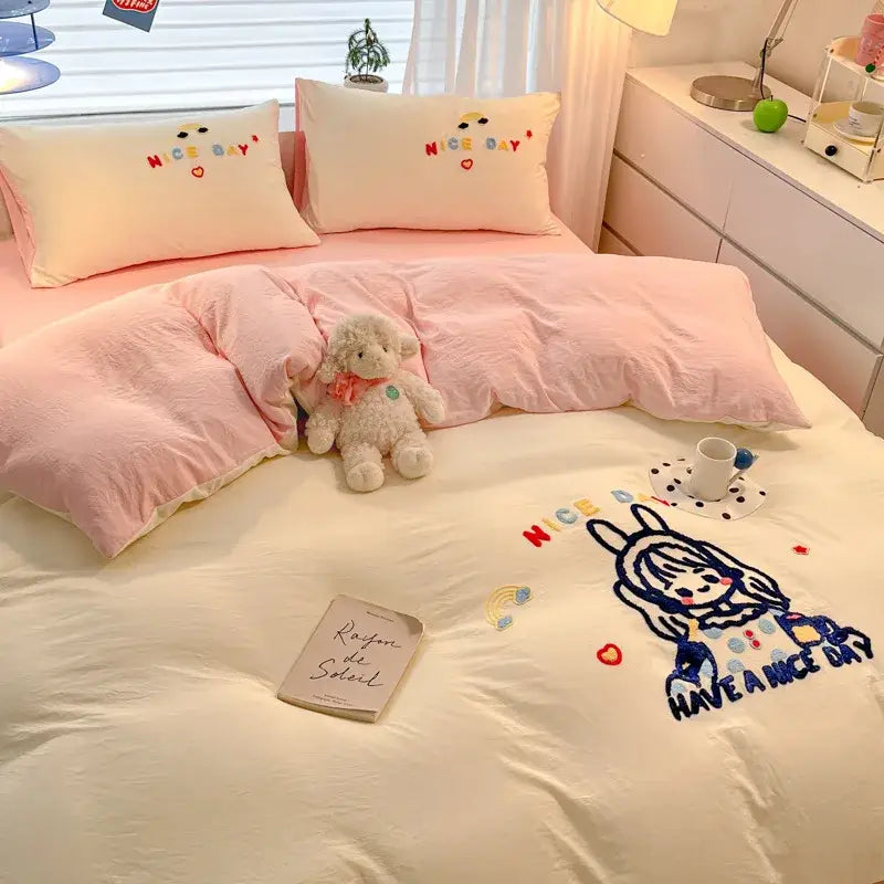 Cream-colored cartoon embroidered cotton bedding set with nice day and bunny design in blue red yellow and black thread