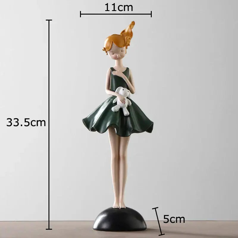 A 33.5cm tall cartoon girl resin sculpture with orange hair holding a white stuffed rabbit on a black base for decorbites