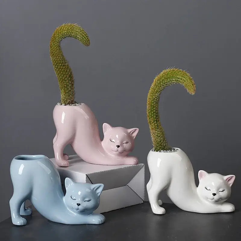 Pastel ceramic cat tail succulent planter featuring curved green cactus tails for bedroom decorbites cat tail decor