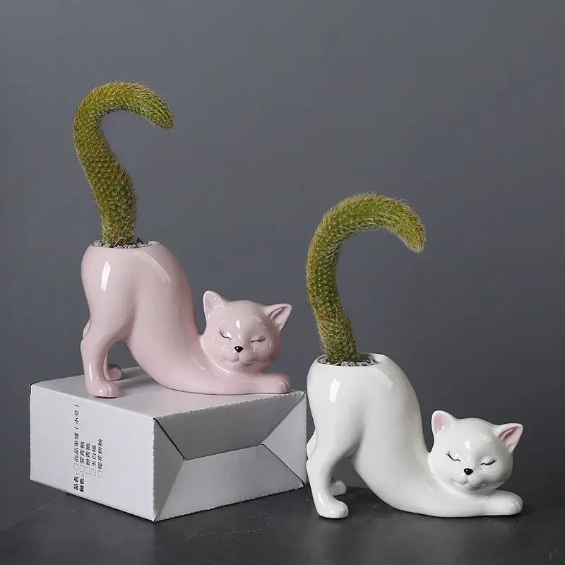 Pastel ceramic cat tail succulent planter in pink and white featuring curved green cactus tails for decorbites cat tail decor