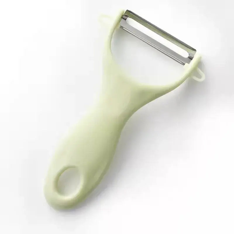 Light green decorbites ceramic kitchen peeler with stainless steel blade from pastel ceramic kitchen peeler set