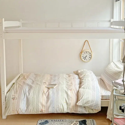 White wooden bunk bed featuring pastel checkered cotton grid pattern bedding set for bedroom decorbites cotton grid
