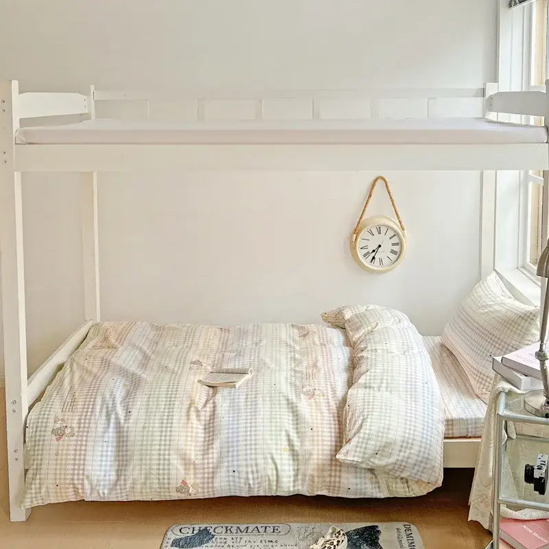 White wooden bunk bed featuring pastel checkered cotton grid pattern bedding set for bedroom decorbites cotton grid