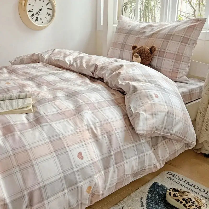 Pastel checkered cotton printed student bedding set with soft pink and gray tones and heart motifs on satin-like fabric
