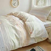 Pastel checkered cotton printed student bedding set featuring soft embroidered cartoon characters and star details decorbites cotton printed