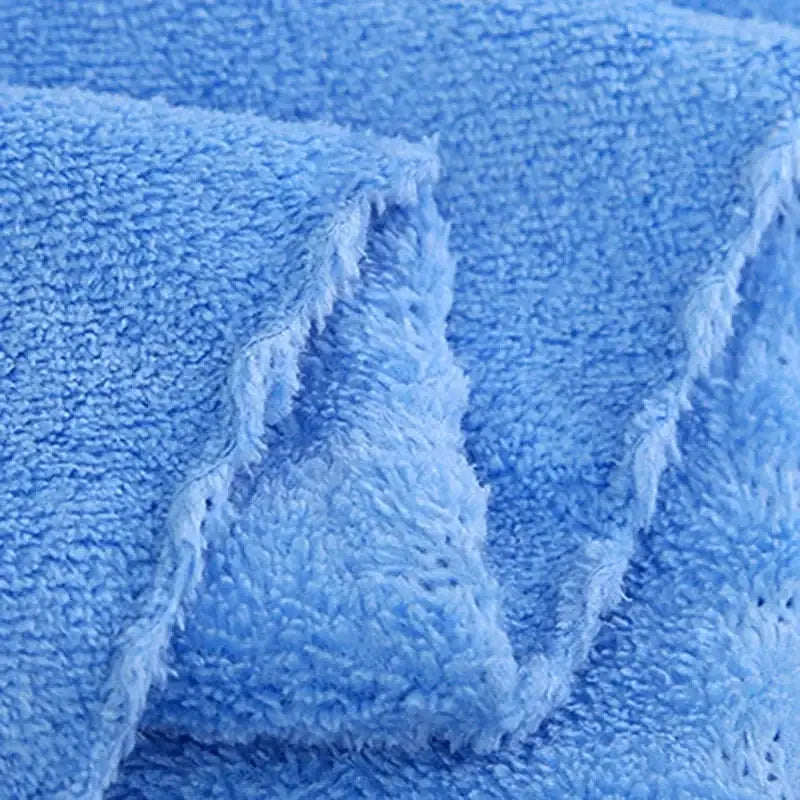 A soft light blue microfiber velvet bath towel with a plush textured surface from decorbites coral velvet set