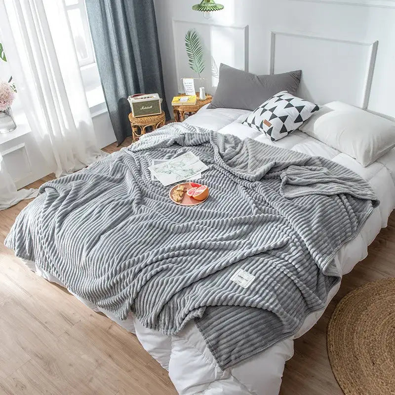 Gray ribbed fleece cozy hug blanket with soft textured surface and white label tag for decorbites soft sweatshirt throw