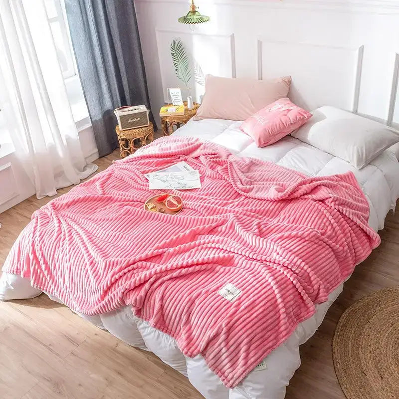 Pink ribbed fleece pastel corduroy cozy hug blanket with soft plush texture and vertical ridges soft sweatshirt throw
