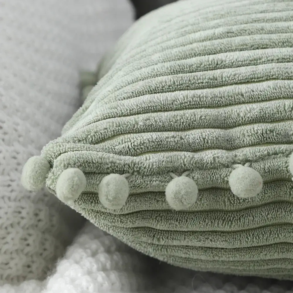 A soft sage green corduroy pompom cushion cover ideal for living room decorbites corduroy pompom pillows