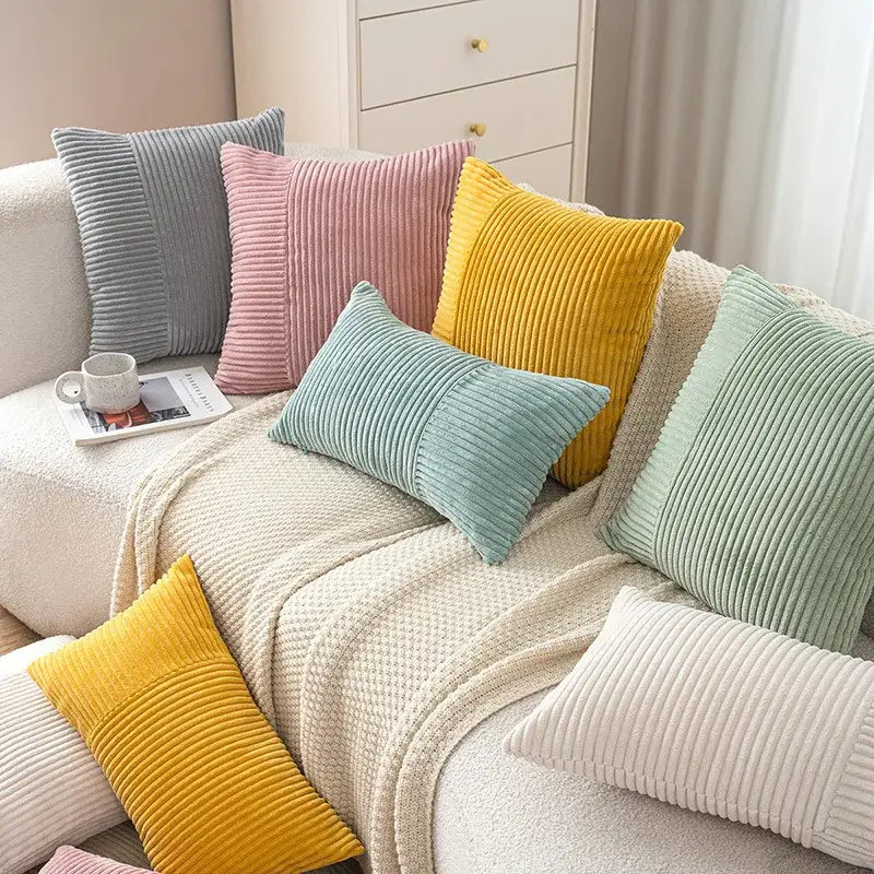 Set of colorful decorbites corduroy striped body pillows in soft pastel shades for lumbar support and decor