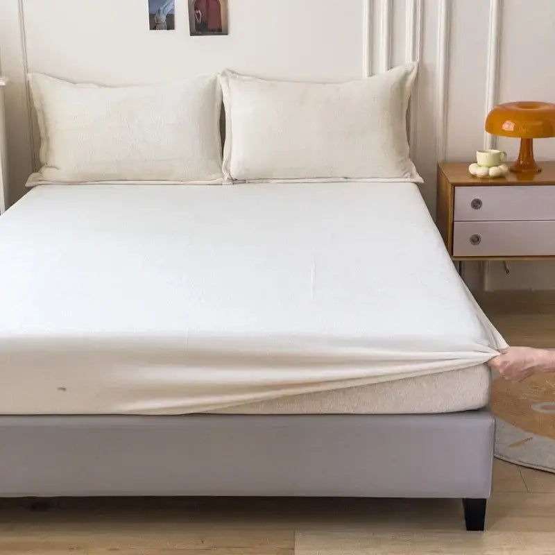 White fitted bed sheet with smooth glossy finish made of decorbites cozy flannel queen plush mattress cover material