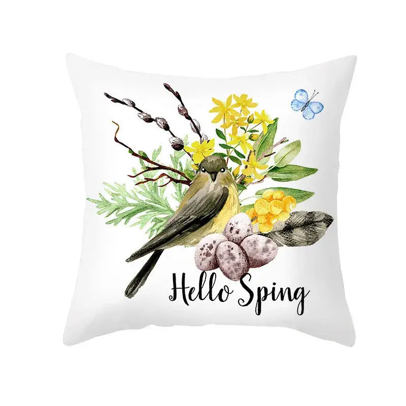 White throw pillow cover with easter egg bunny watercolor design and hello spring text for living room decor