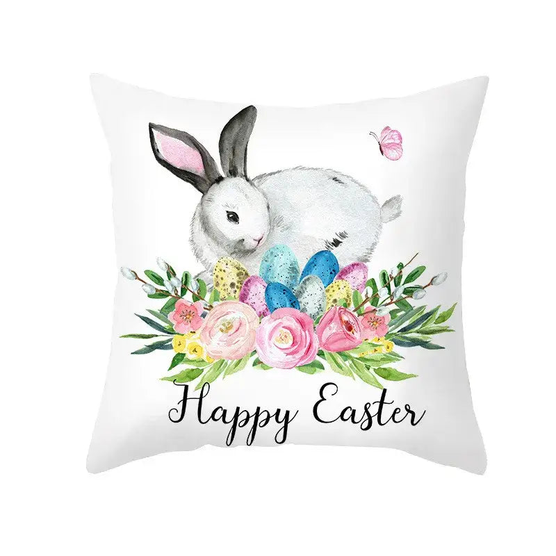White throw pillow cover featuring easter egg bunny watercolor design with pastel eggs and happy easter script