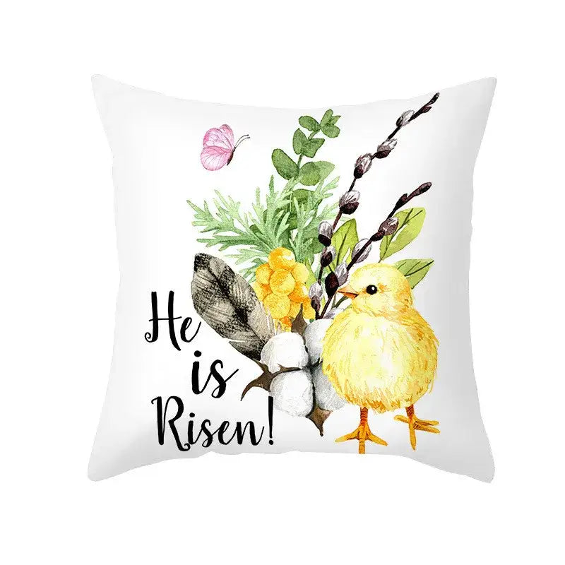 White throw pillow cover with watercolor yellow chick greenery and he is risen script for easter egg bunny decor