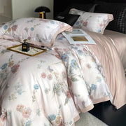 Pastel floral flowers prints bedding set in satin with soft pink blue and lavender blossoms on creamy background