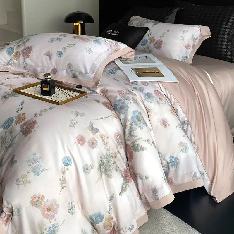 Pastel floral flowers prints bedding set in satin with soft pink blue and lavender blossoms on creamy background