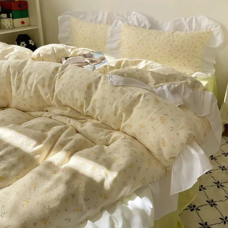 Cream-colored pastel floral korean lace bedding set with delicate yellow blossoms and white ruffled edges for decorbites korean lace decor