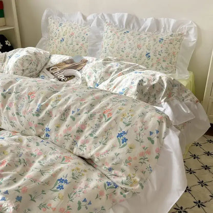 Pastel floral korean lace bedding set featuring soft blossoms cream base ruffled edges and white pillowcases decorbites korean lace