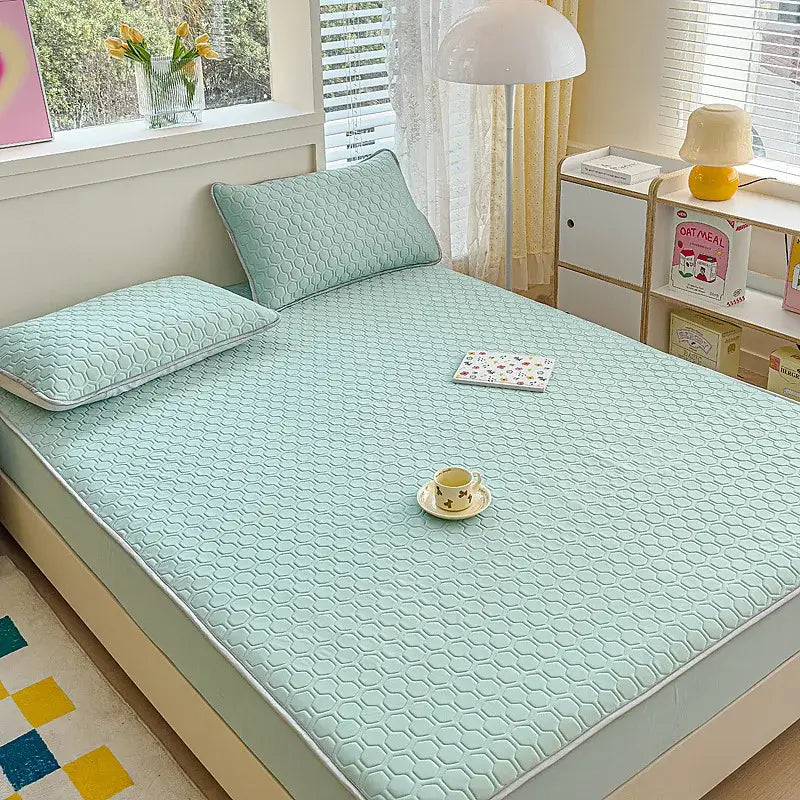 Pastel floral quilted latex fitted sheet set mint green bed pad with hexagonal pattern and light gray piping edges