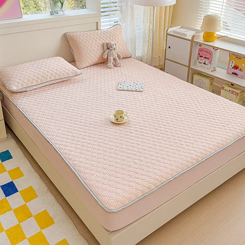 Pink hexagonal quilted latex fitted sheet set bed pad with light gray border for bedroom use