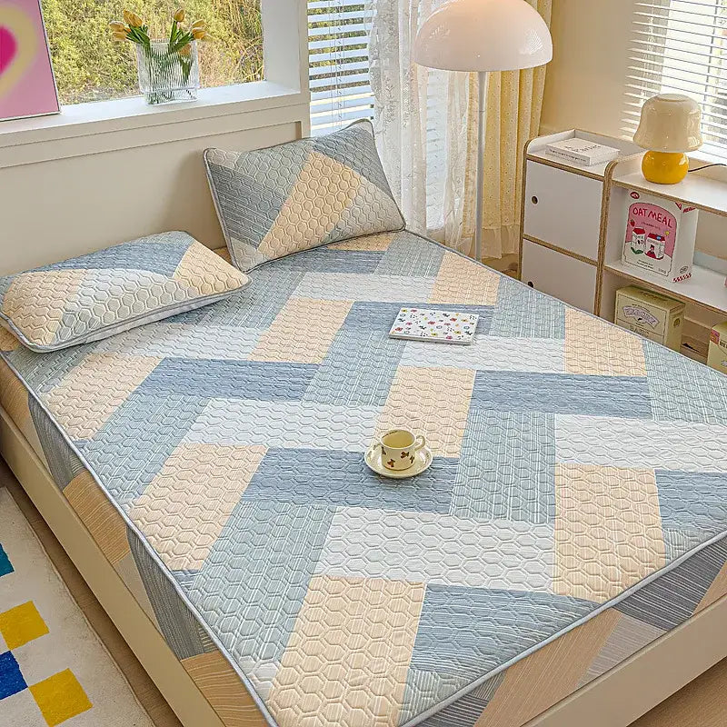 Soft quilted latex fitted sheet set bed pad with geometric blue and beige pattern for bedroom use