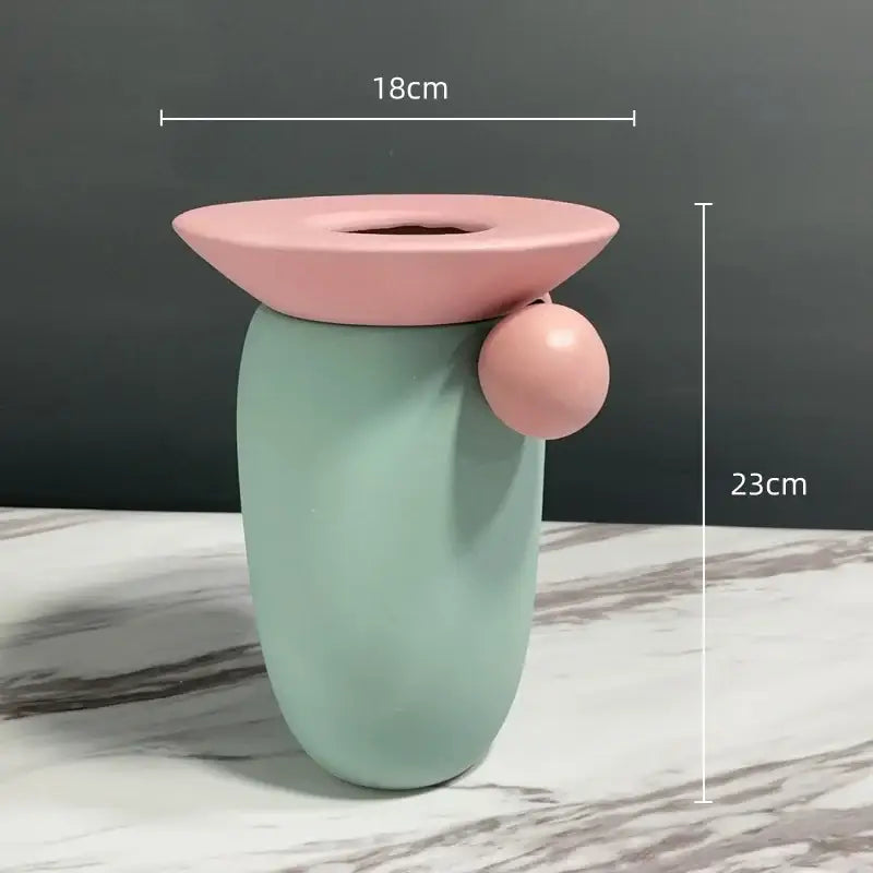 Pastel green geometric ball ceramic vase with pink flared rim and spherical accent for decorbites living room decor