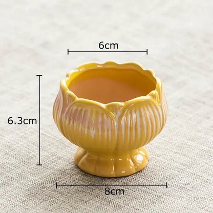A yellow lotus flower ceramic planter with glossy finish and ridged petal details for decorbites lotus flower decor