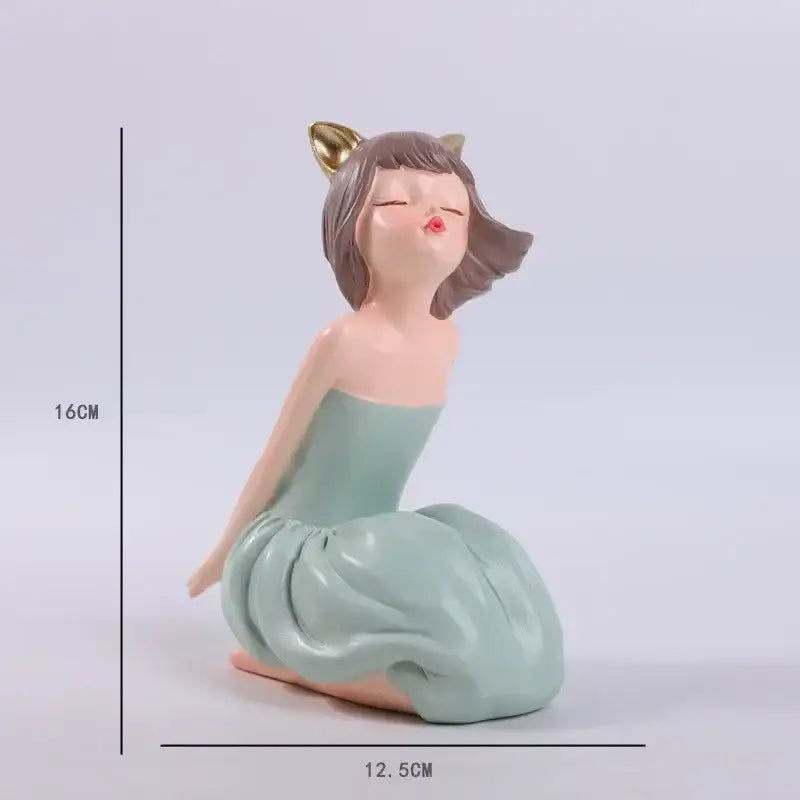 A delicate pastel green resin bowknot fairy girl figurine with golden cat ears for bedroom decor