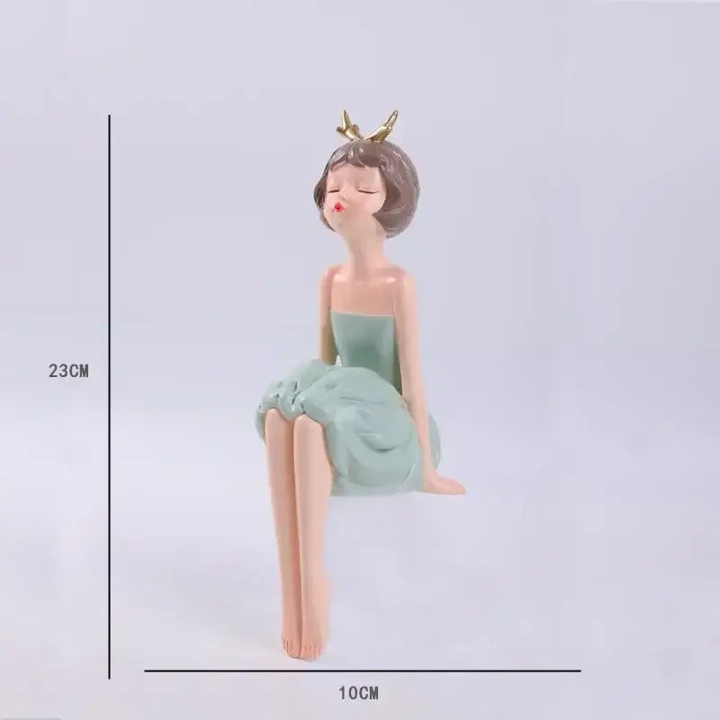 A pastel green bowknot fairy girl resin figurine with gold antler headpiece for bedroom decor