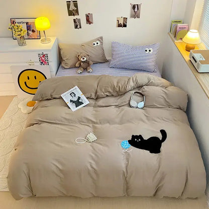 Beige duvet cover with black cat playing with blue ball in pastel green decorbites cartoon embroidery bedding set