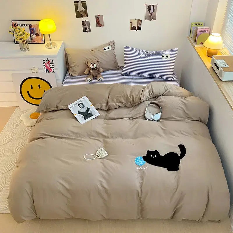 Beige duvet cover with black cat playing with blue ball in pastel green decorbites cartoon embroidery bedding set