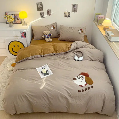 Beige quilted bedding set with decorbites cartoon embroidery of a dog wearing glasses and red beret on duvet cover