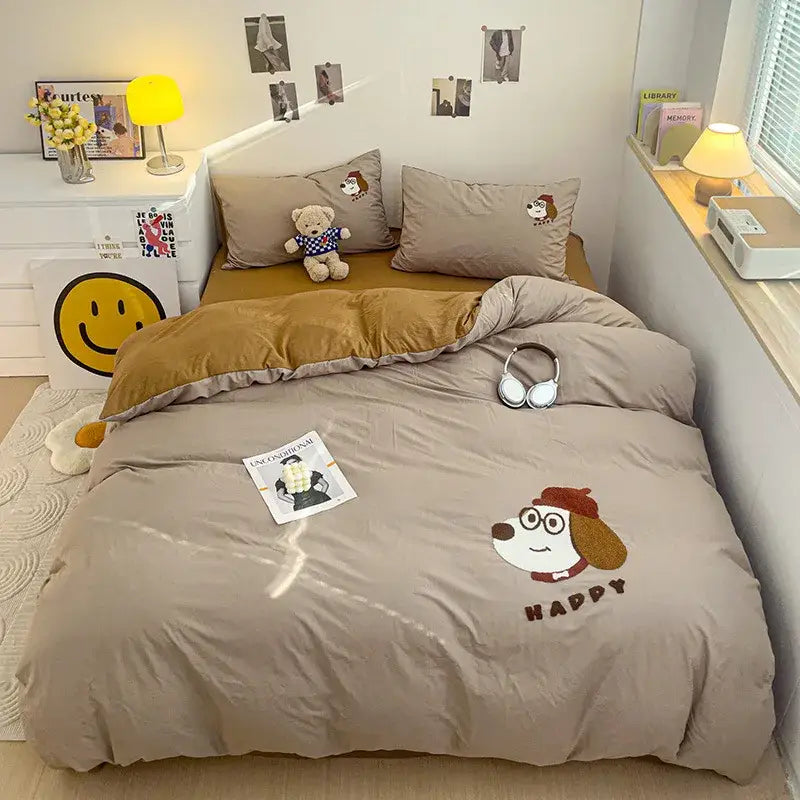 Beige quilted bedding set with decorbites cartoon embroidery of a dog wearing glasses and red beret on duvet cover