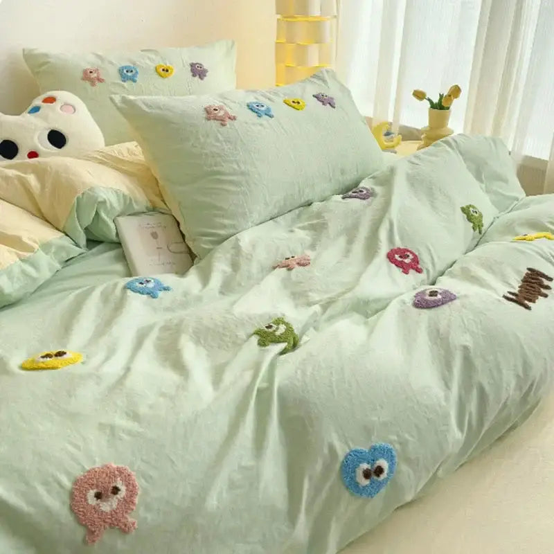 Pastel green cartoon towel embroidery bedding set featuring mint green embroidered monster-themed decorbites cartoon towel design