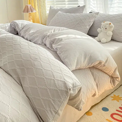 Soft off-white quilted duvet cover with subtle diamond pattern from decorbites fresh bubble yarn bedding set