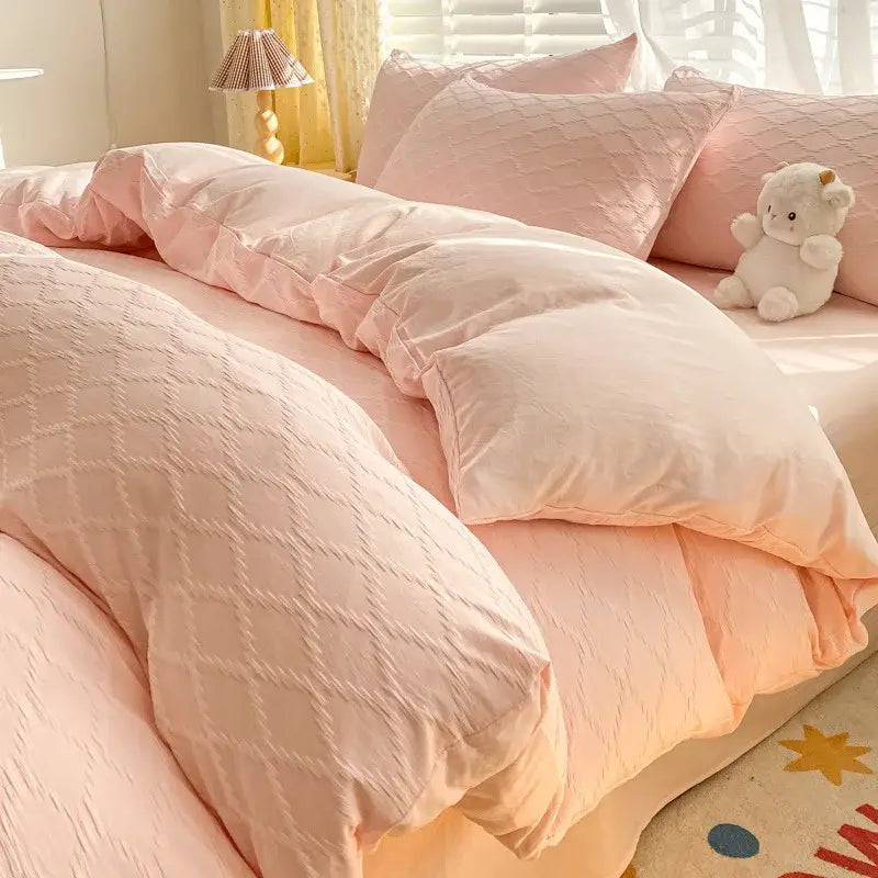 Pink quilted duvet cover featuring a soft textured diamond pattern from decorbites fresh bubble yarn bedding set