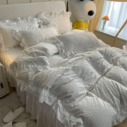 White ruffled bedding set with textured fabric and layered frills made from lace bubble cotton for bedroom use