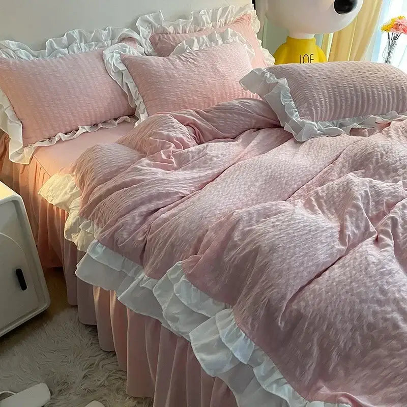 Pink textured bedding set with white ruffled trim featuring lace bubble cotton for a pastel green and white duvet bedroom