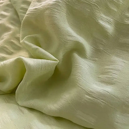 Pastel green and white lace bubble cotton bedding set with soft pale green crinkled cotton fabric and subtle texture